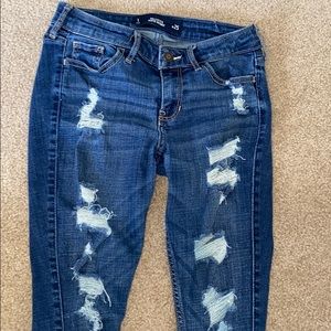 Hollister skinny dark wash ripped low rise jeans